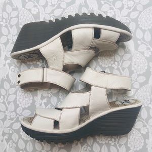 Fly London “Yair Mousse” White Wedge Sandals